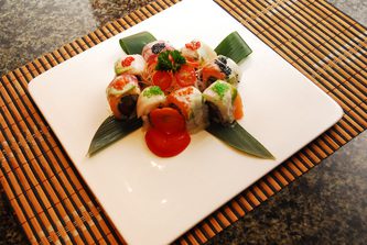 A sushi dish in the shape of a flower.